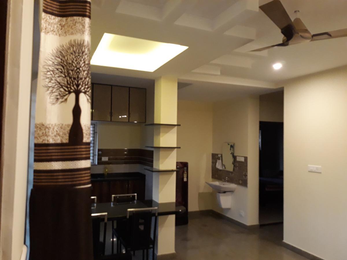 Aikya Apartment มังคาลอร์ ภายนอก รูปภาพ